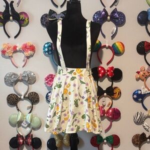Disney Rapunzel Cream Skirt with Green Chameleon and Purple Floral Print